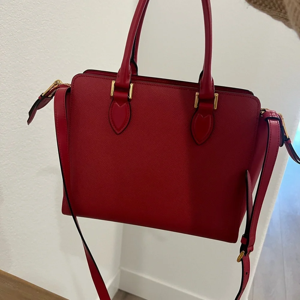 Red Prada like new wore two times serious offers only